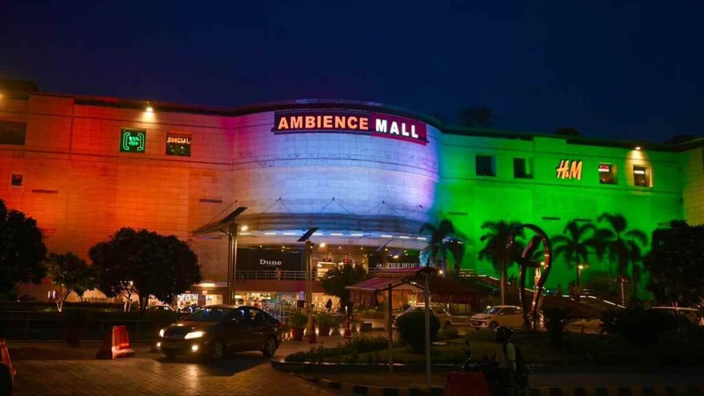 Ambience Mall decorated in Indian tricolour for 80th Independence Day celebrations, featuring the Eternal Flame of Valour installation.
